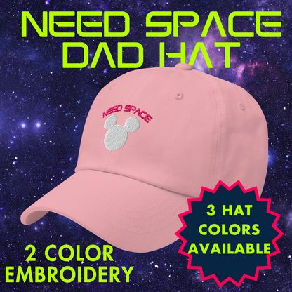 Need Space embroidered hat celebrating Space Mountain's 50th Anniversary, featuring a Mickey Mouse silhouette against a starry space background on a pink dad hat.